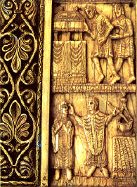 Una de las tablillas de marfíl (s.XI) de la arqueta donde reposaban los restos de San Millán; se alude en ella al milagros de los ciegos en la parte superior, y al de la lámpara en la inferior.