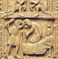 Marfil de la arqueta de San Milln, s.XI. Los endemoniados tratan de quemar a San Milln en su cama. No slo no lo conseguirn sino que inician una pelea entre ellos lo que provoca que el Santo se despierte y se ra de ellos.