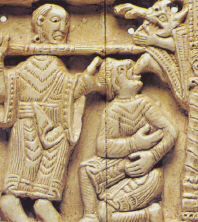 Marfil de la arqueta de San Milln, s.XI.  Recrea el segundo milagro donde se  relata la historia de un dicono poseido por el demonio que es llevado ante el Santo para que le cure. ste le orden abandonar el cuerpo del dicono  y al instante le obedeci.